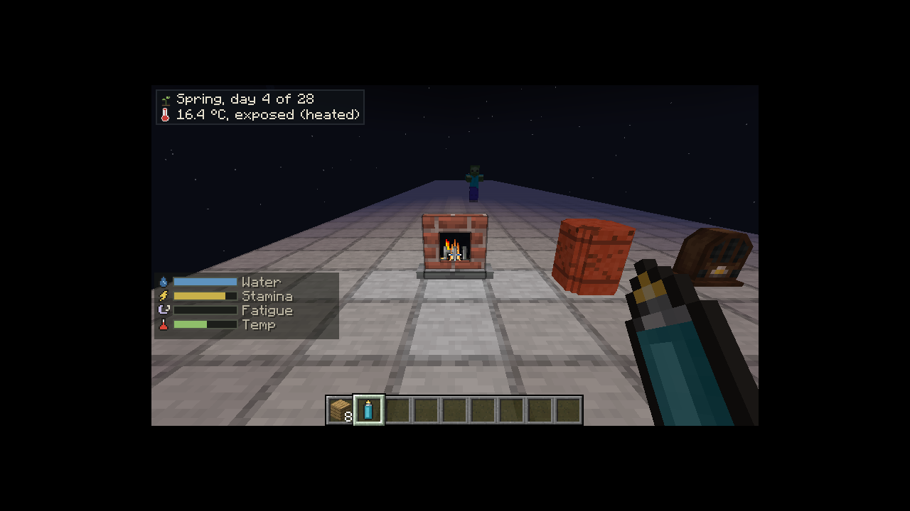 A lit fireplace in a developer test area with the heated status visible.